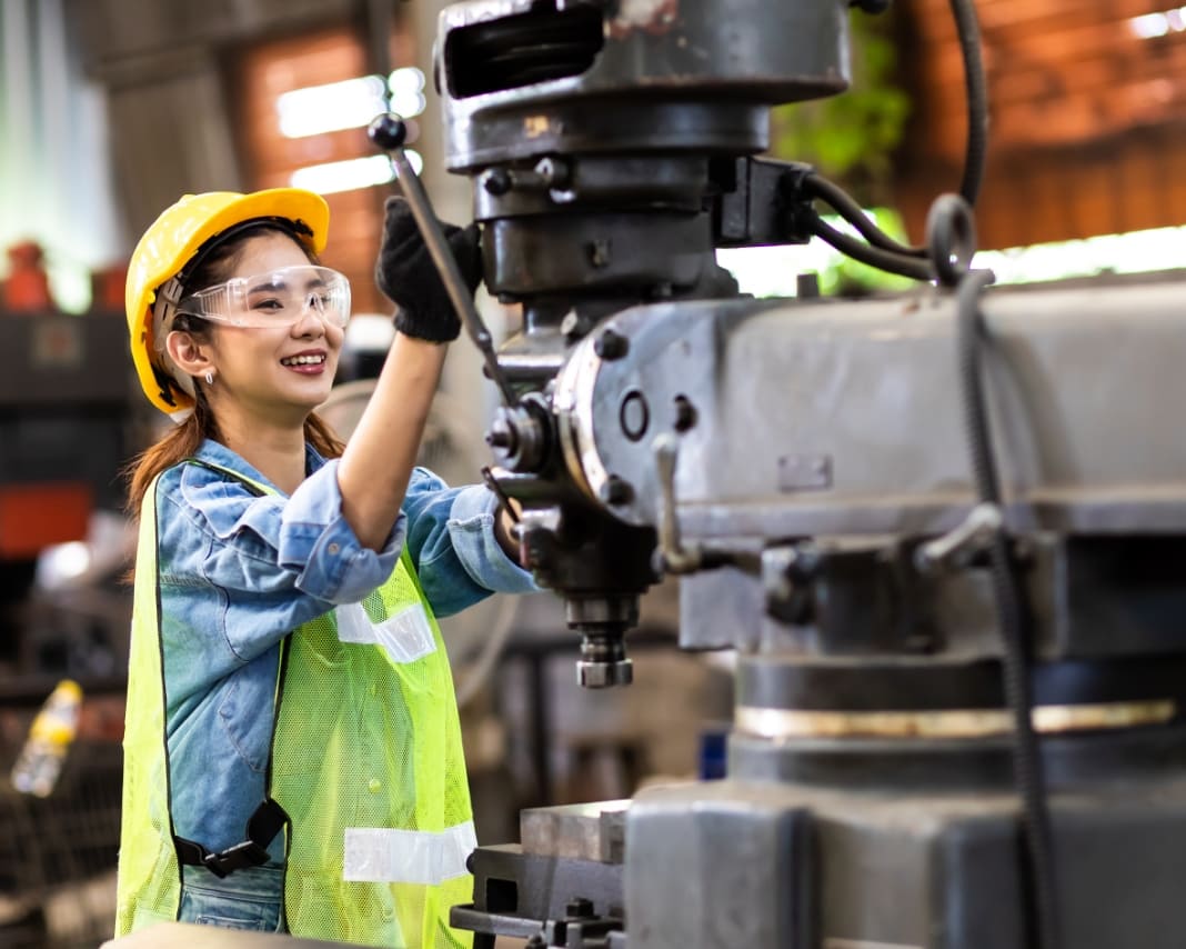 Worker using a machine tool