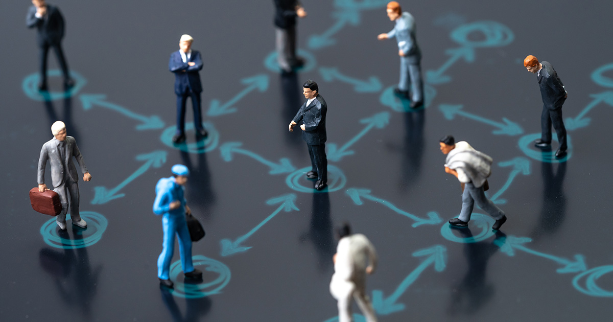 figurines on a strategy drawing