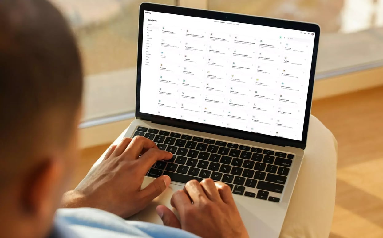 Person uses a laptop displaying an AI writing platform’s library of templates for blogs, ads, product descriptions and other content.