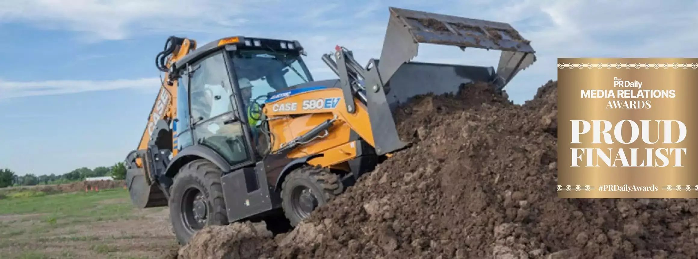 CASE 580EV electric backhoe loader moves a pile of dirt beside a PR Daily Media Relations Awards finalist graphic.