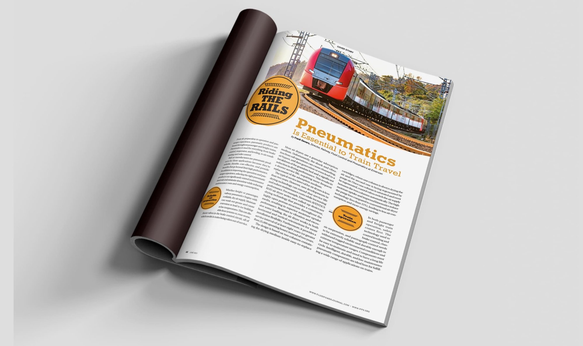 Magazine article titled “Pneumatics Is Essential to Train Travel,” featuring a red passenger train traveling along railway tracks.
