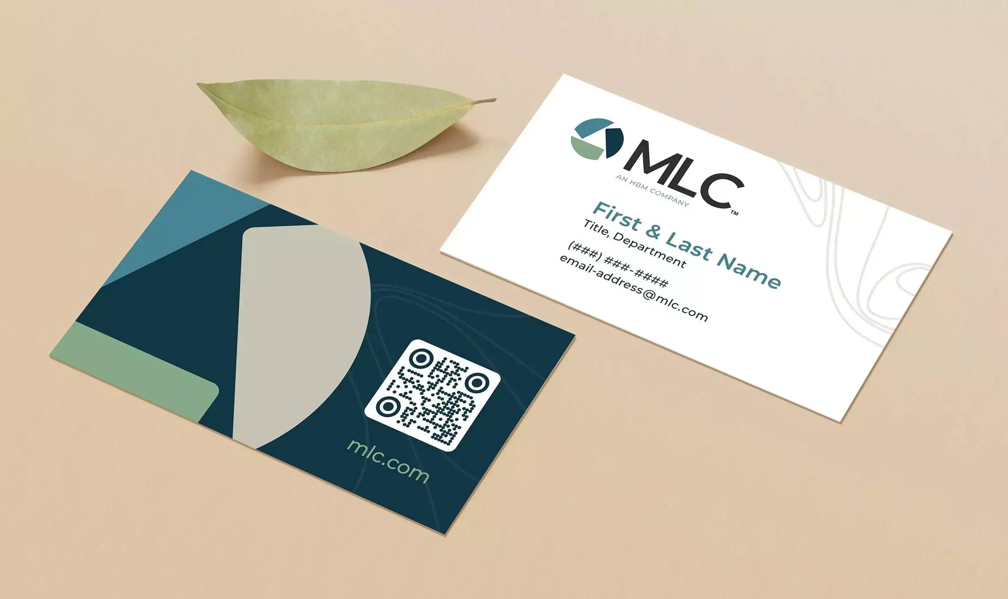 MLC business cards showcase the new logo, green and blue color palette, geometric graphics and QR code.