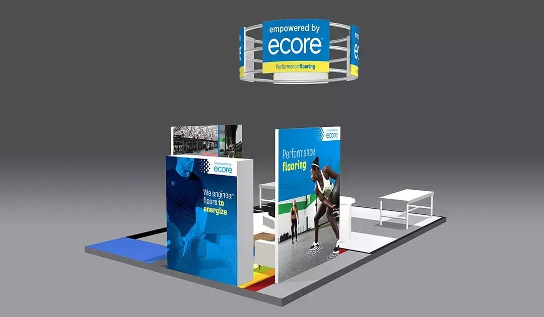 Ecore trade show booth features performance flooring graphics, athlete photography and Empowered by Ecore branding.